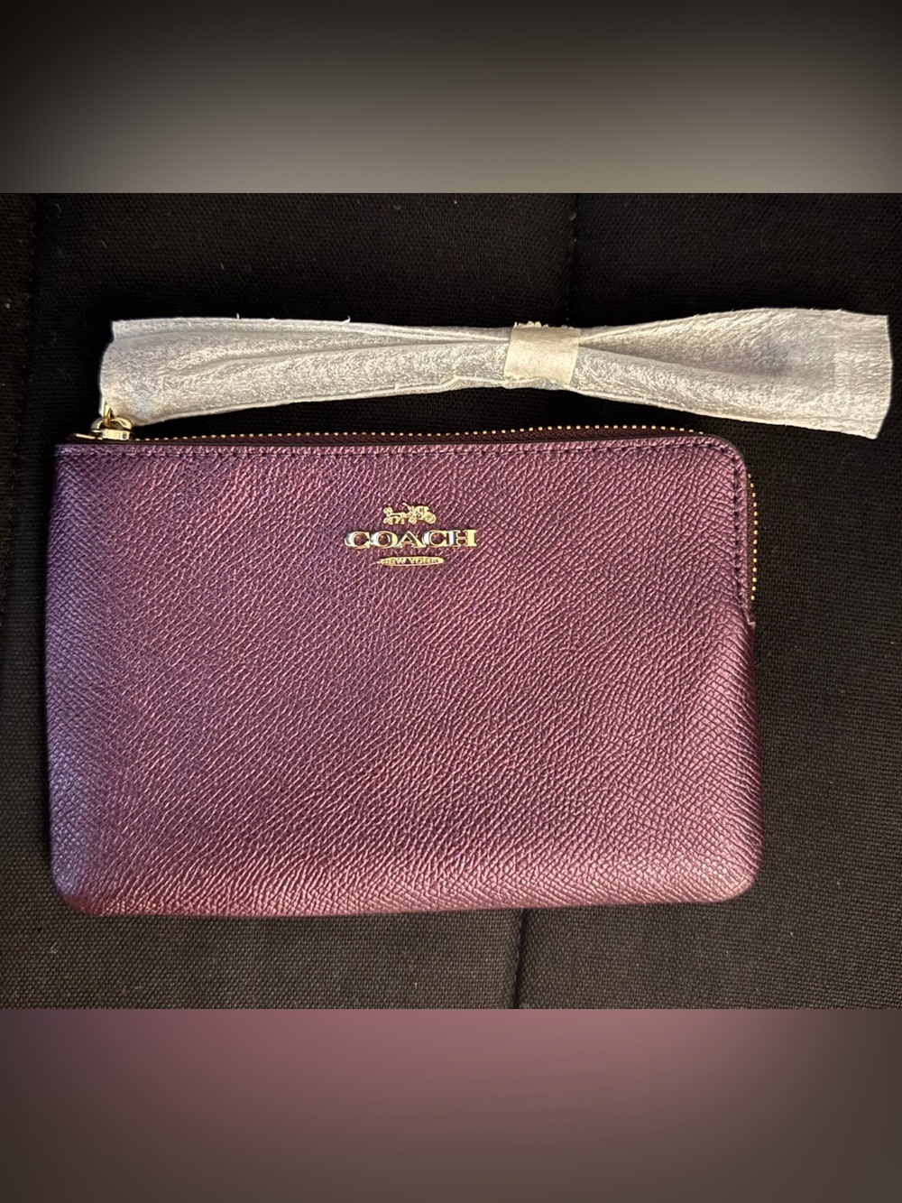 COACH Pebbled Leather Wristlet in Plum